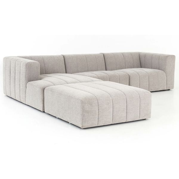 Sofa narozna o lekkiej bryle z subtelnym wyrazem w odcieniu bieli