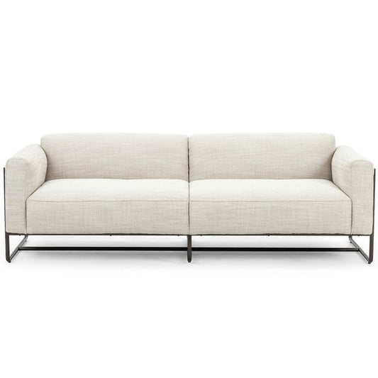 Sofa tapicerowana o wyrazistej formie z eleganckim profilem w odcieniu bieli