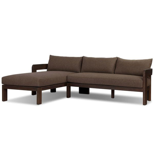Sofa narozna o dekoracyjnym profilu z wywazonymi proporcjami w odcieniu brazu
