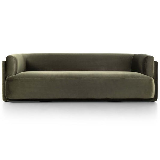 Sofa tapicerowana o harmonijnych proporcjach z miekka linia w odcieniu brazu