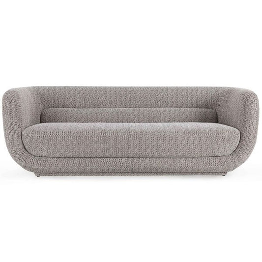 Sofa tapicerowana o lekkiej bryle z wyraznym zarysem w odcieniu szarosci